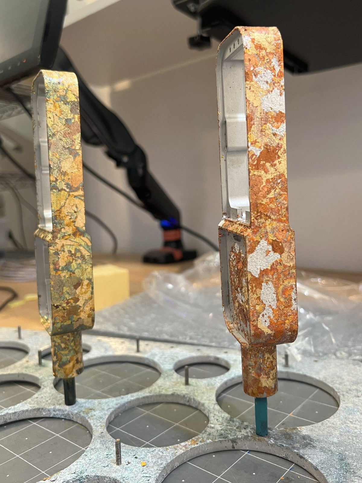 Golden Hour and Ember Leaf bodies with fresh metal leaf, drying in the East LA paint shop
