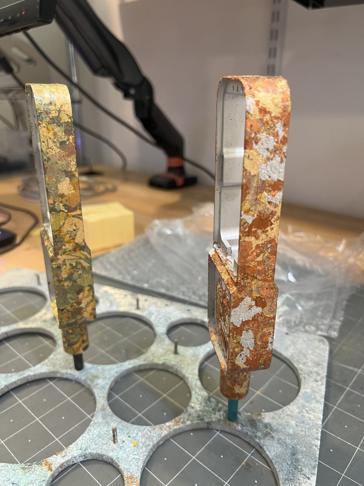 Golden Hour and Ember Leaf bodies with fresh metal leaf, drying in the East LA paint shop