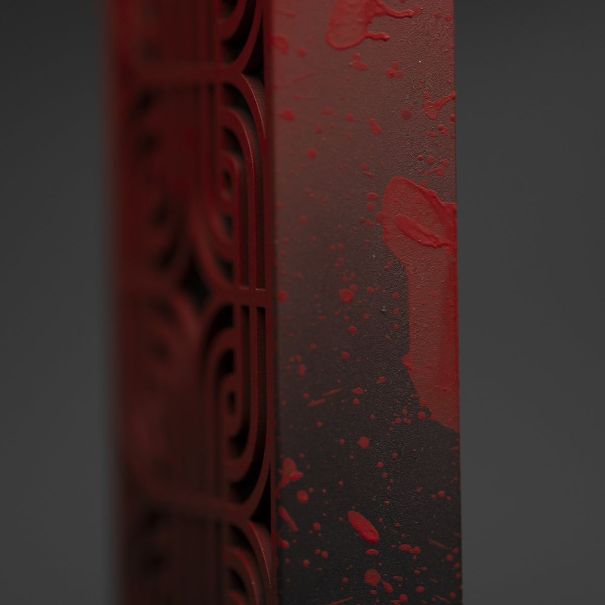 Red paint dripping down the side of Bloodline's grille