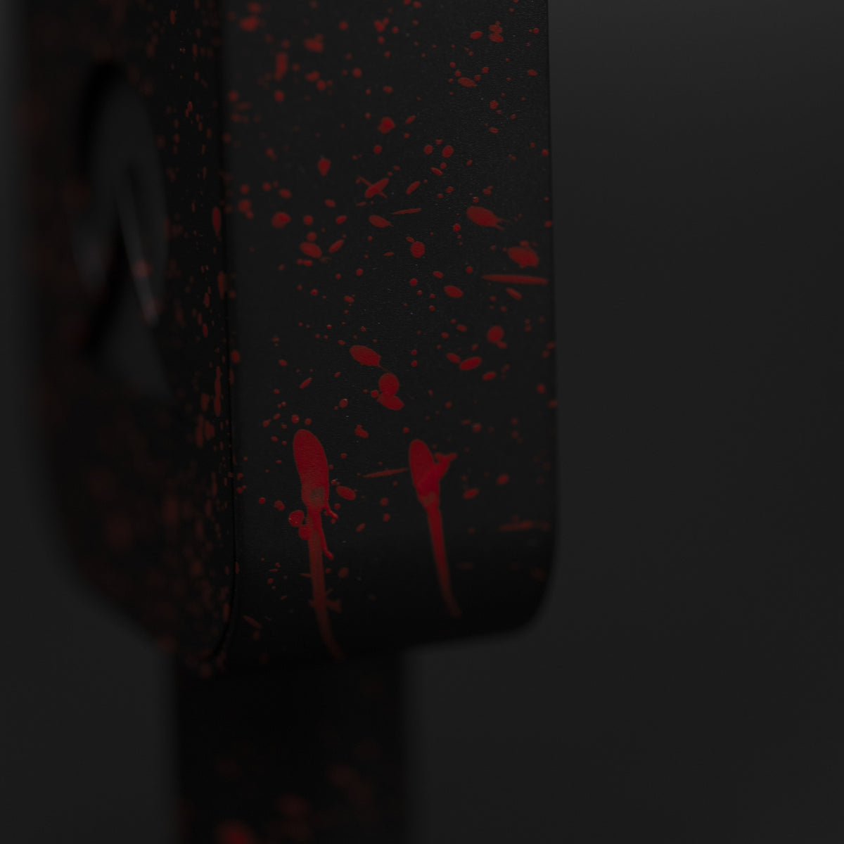 Blood-red drips running down the black body of Bloodline